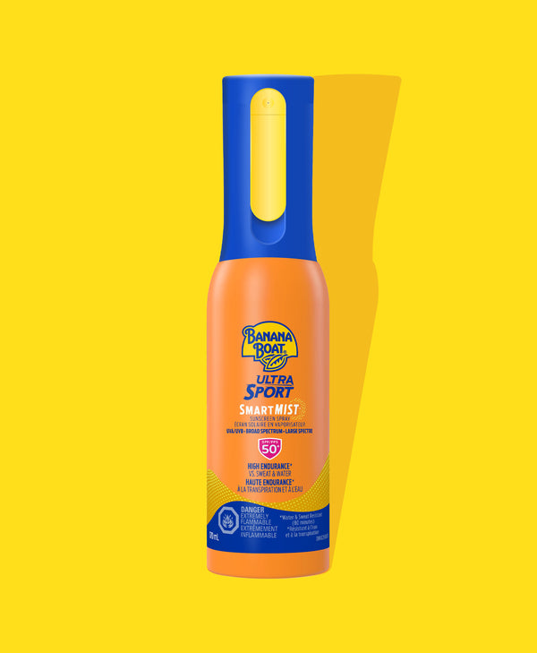Front of Banana Boat Ultra Sport SPF 50 SmartMist sunscreen spray bottle on a yellow background