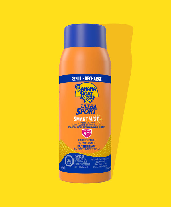 Front of Banana Boat Ultra Sport SPF 50 SmartMist Refill sunscreen bottle, featuring branding, high endurance claims, and flammability warning, set against a yellow background.